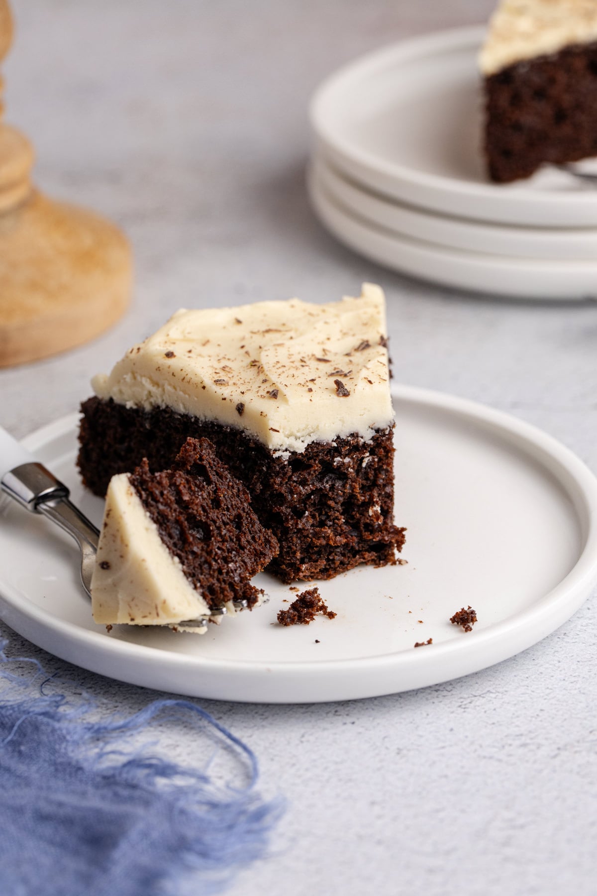 A fork with a slice of Irish cream cake on the side of the plate.