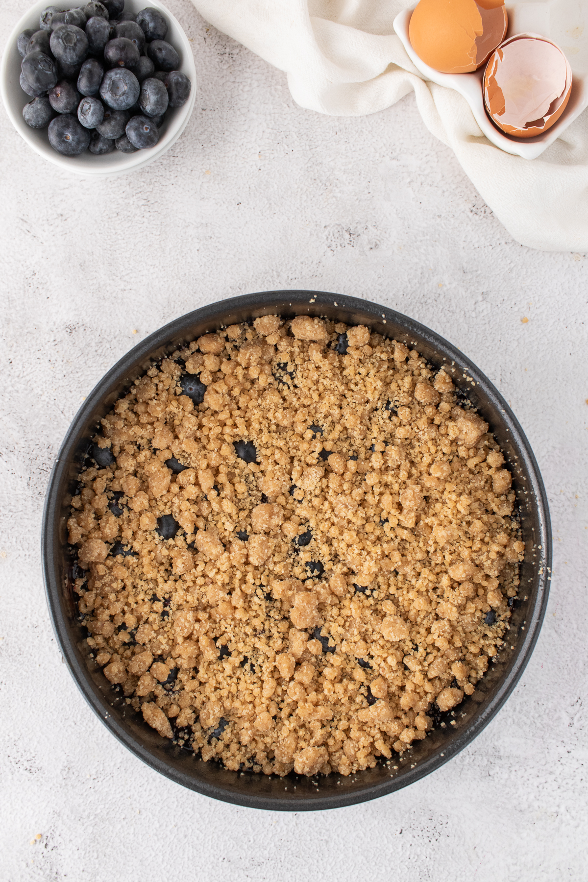 Streusel added to the top of the cake.
