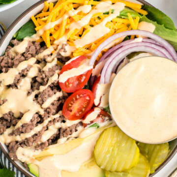 A burger bowl on a table.
