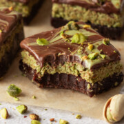 Dubai chocolate brownies with a bite taken out of it.