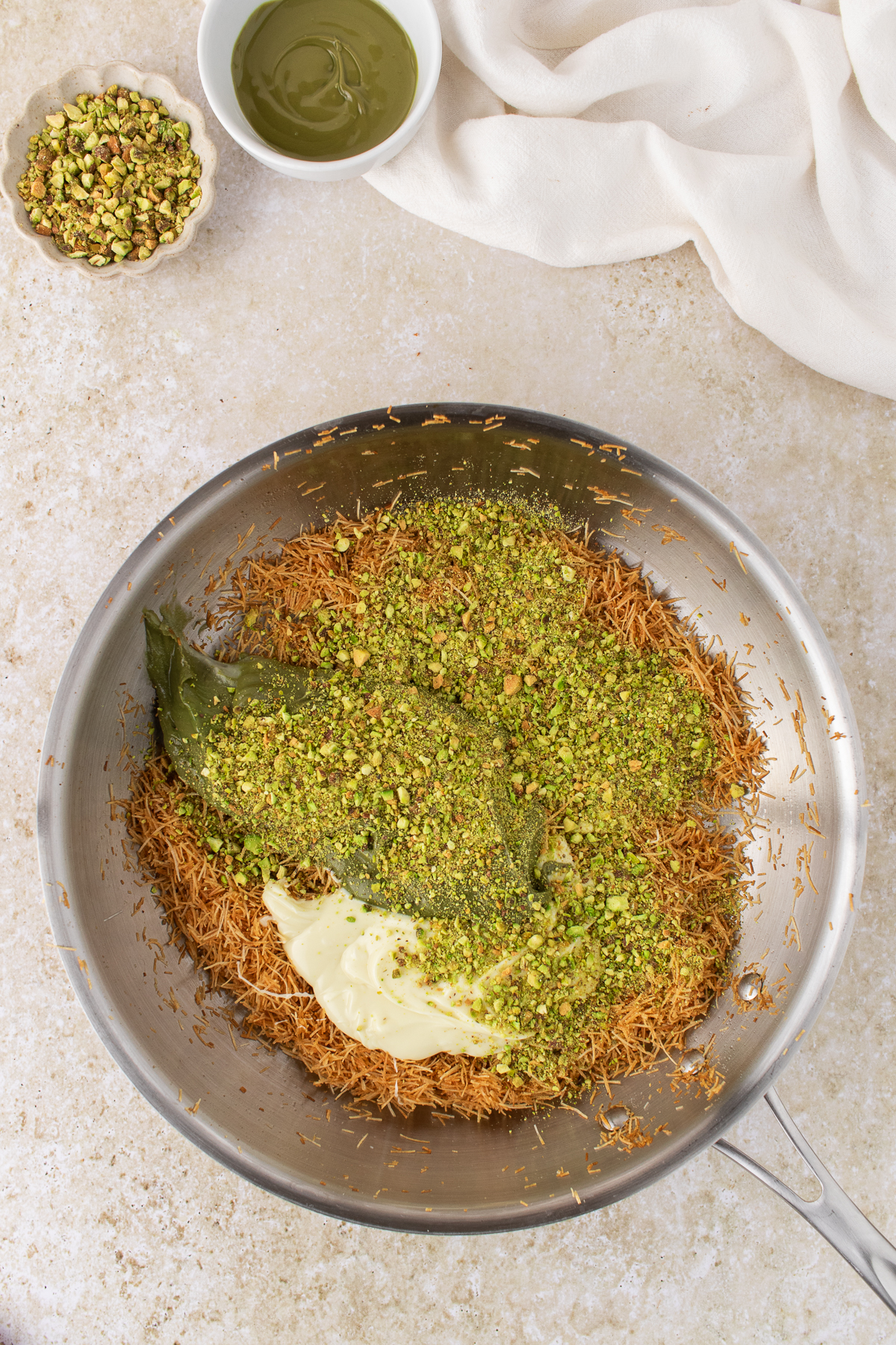 All the ingredients in a bowl to make the pistachio layer.
