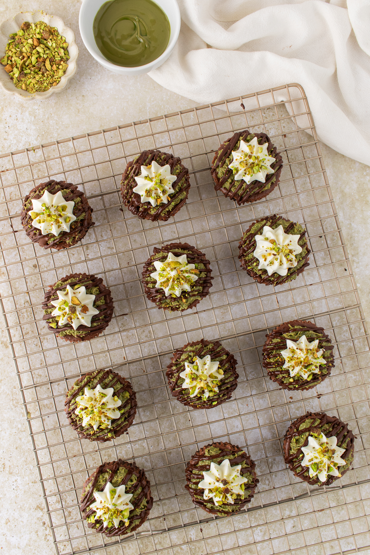 Dubai chocolate cheesecakes with filling and decoration on top.