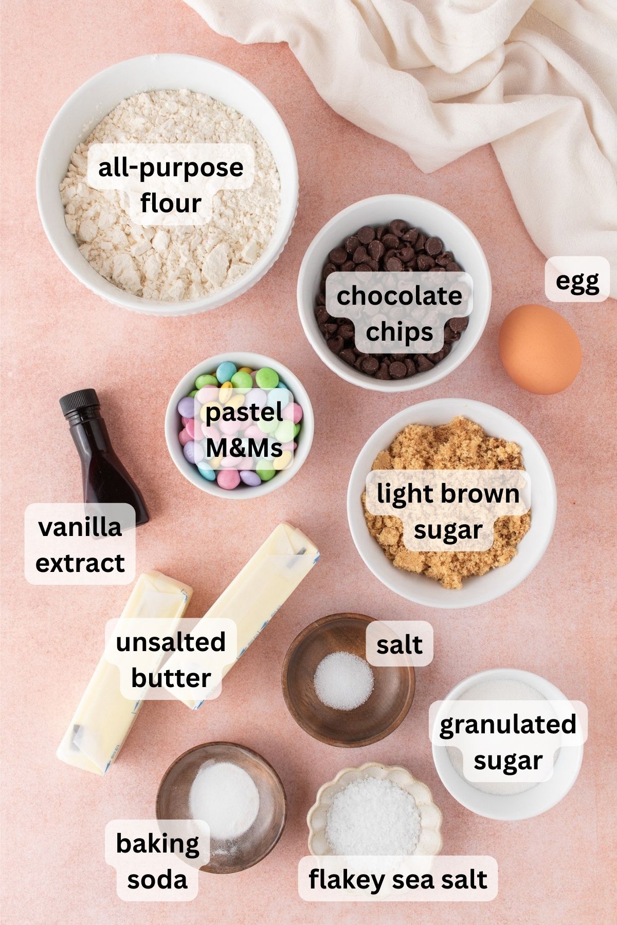 Ingredients to make these Easter M&M cookies on a table.