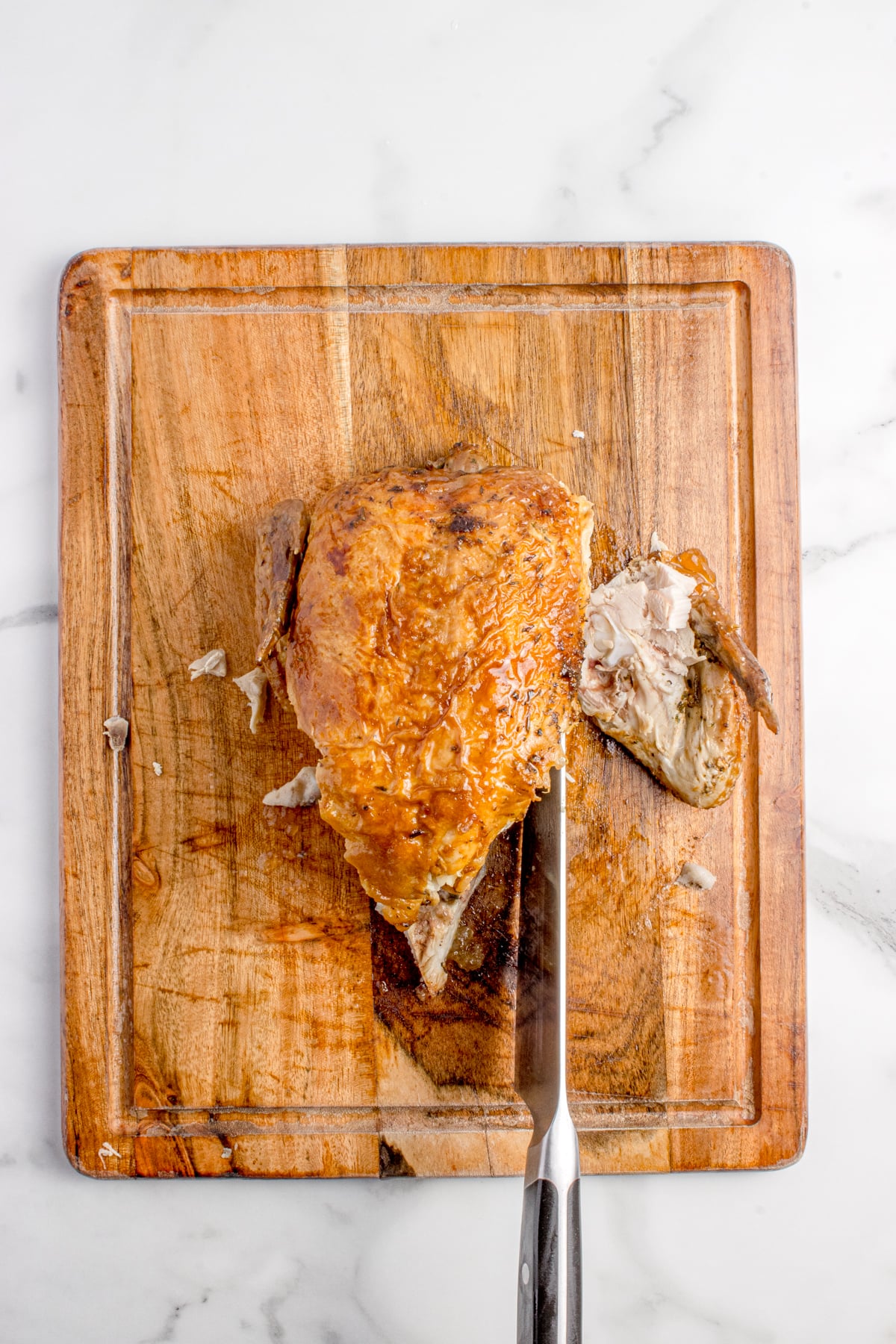 Both wings are removed from chicken.