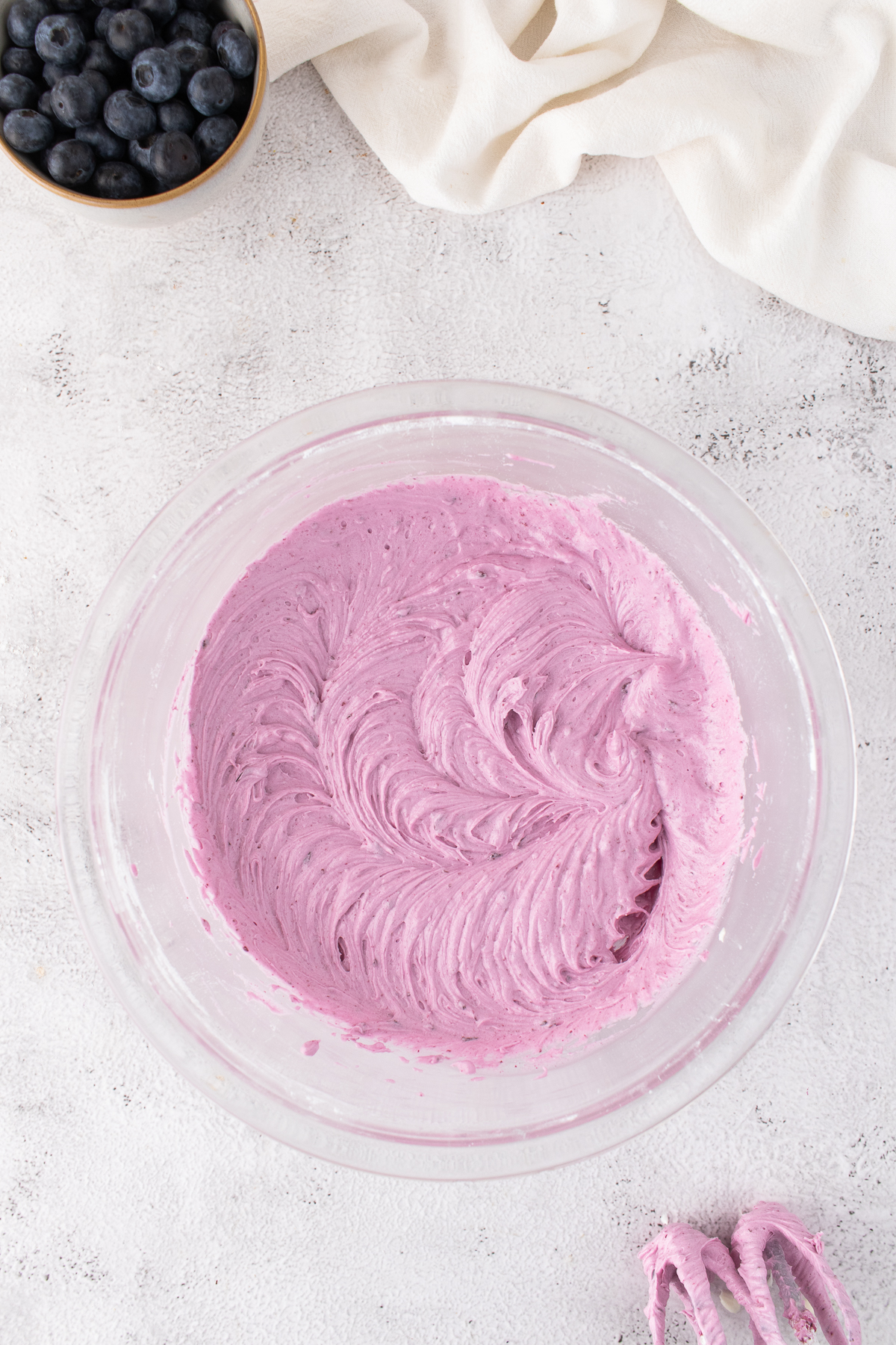 Frosting made in a bowl.