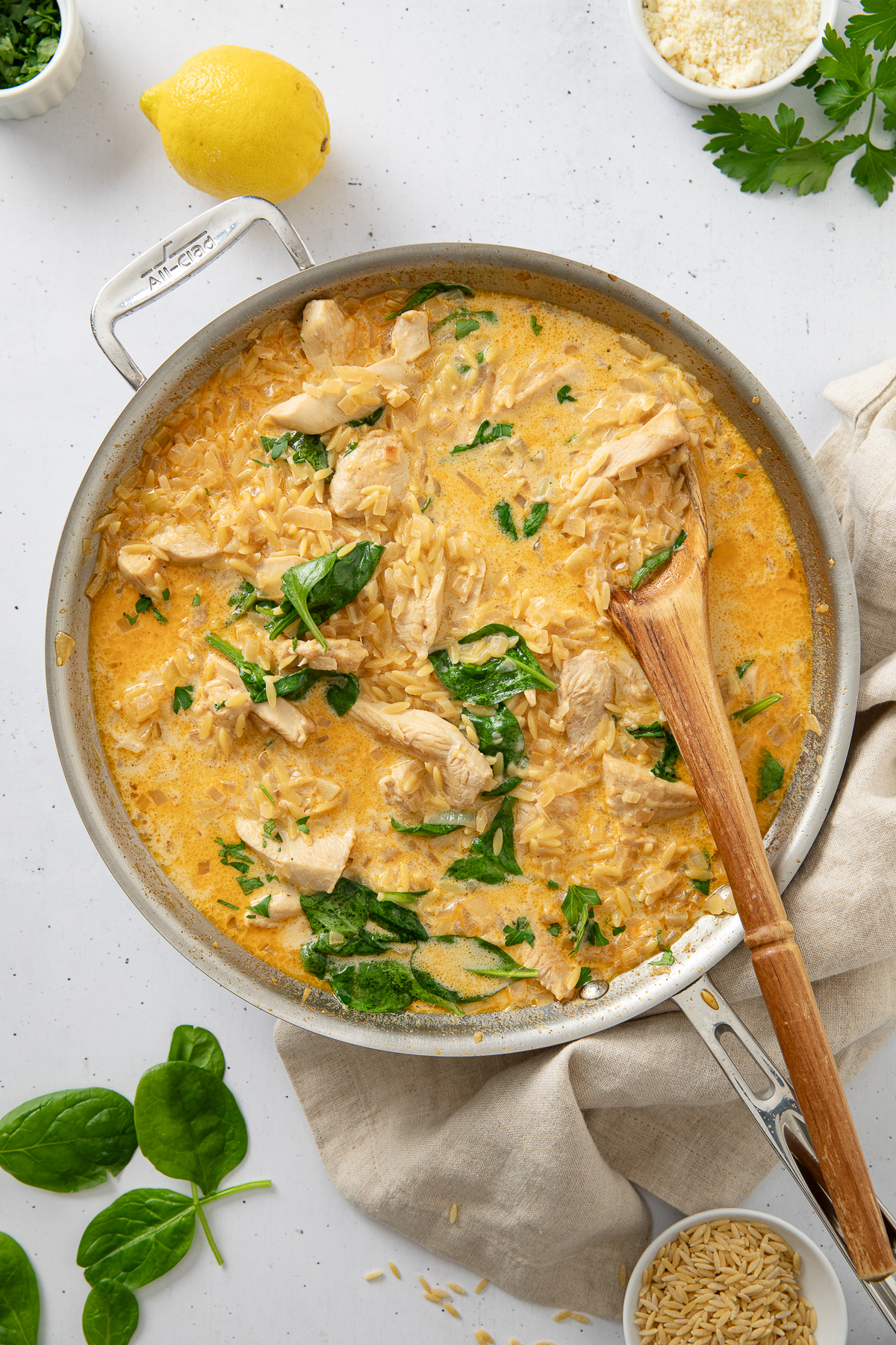 Heavy cream, spinach and Parmesan added to the pan.