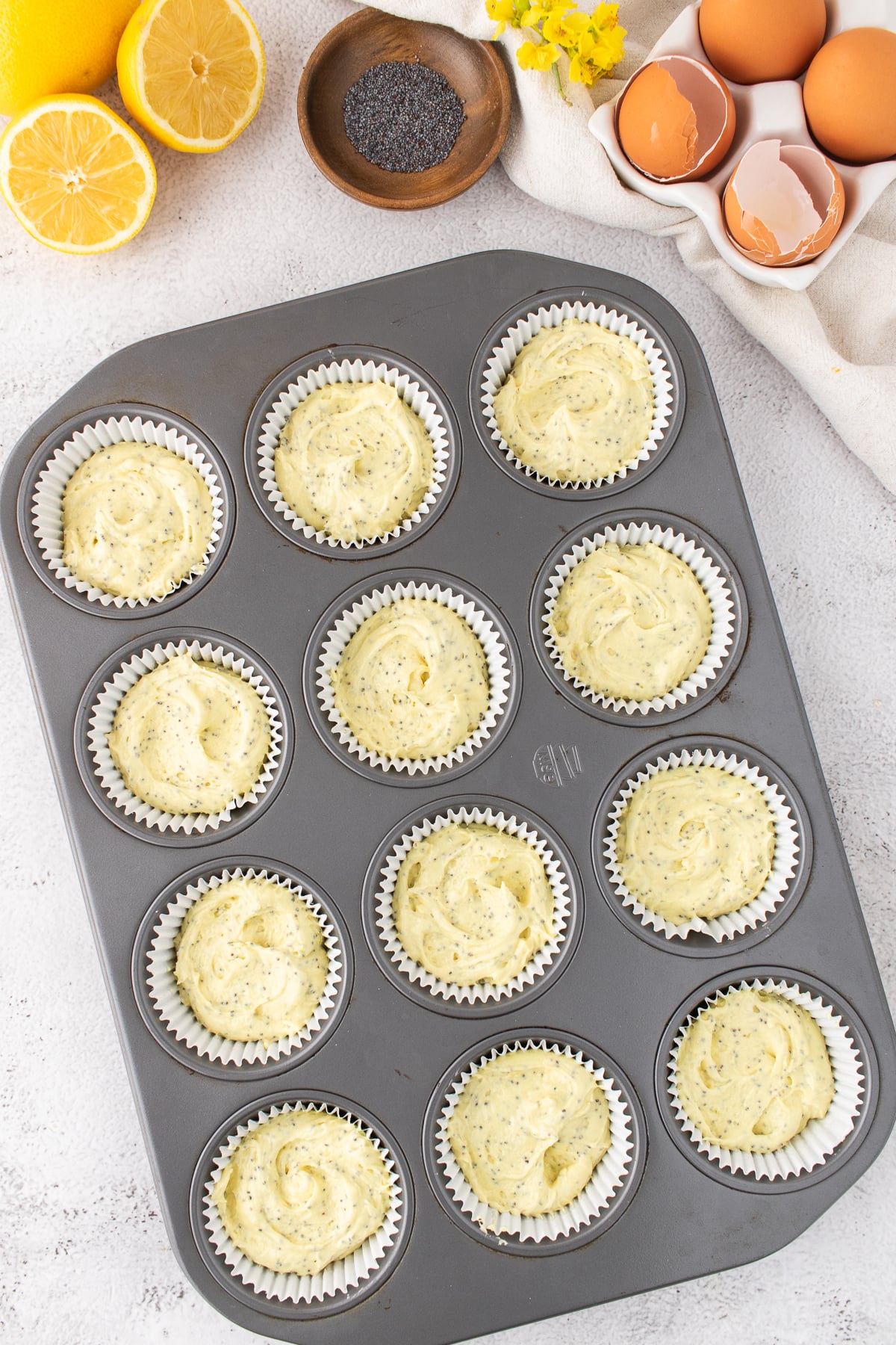 The batter added to the cupcake liners.