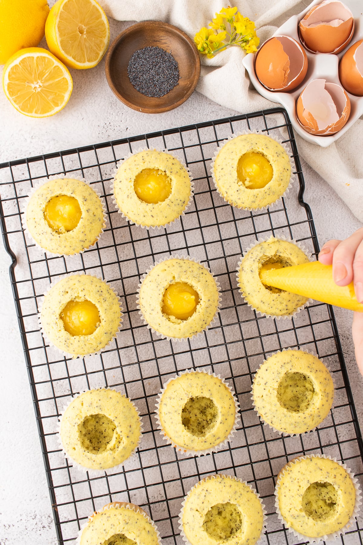 Lemon curb filling the center of the cupcakes.