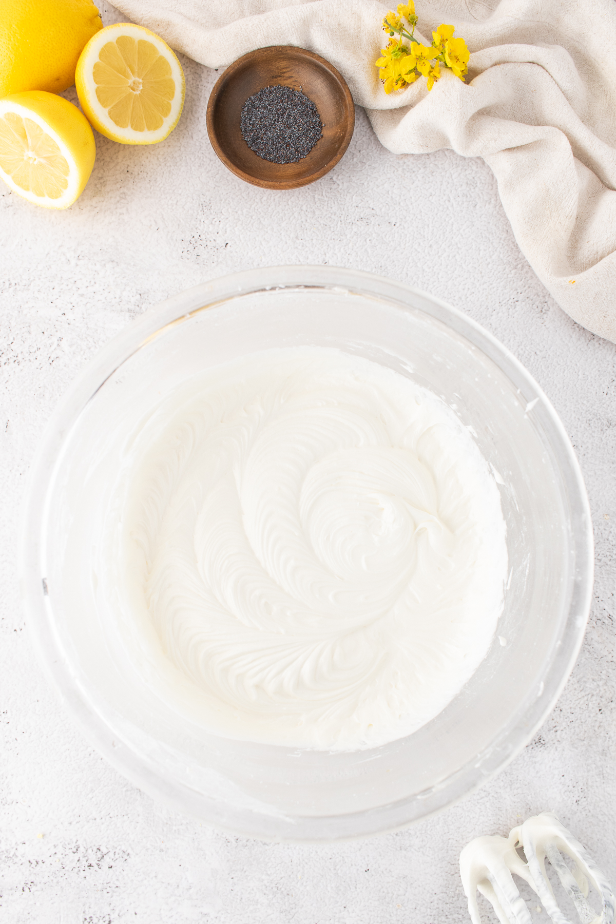 Cream cheese frosting in a bowl.