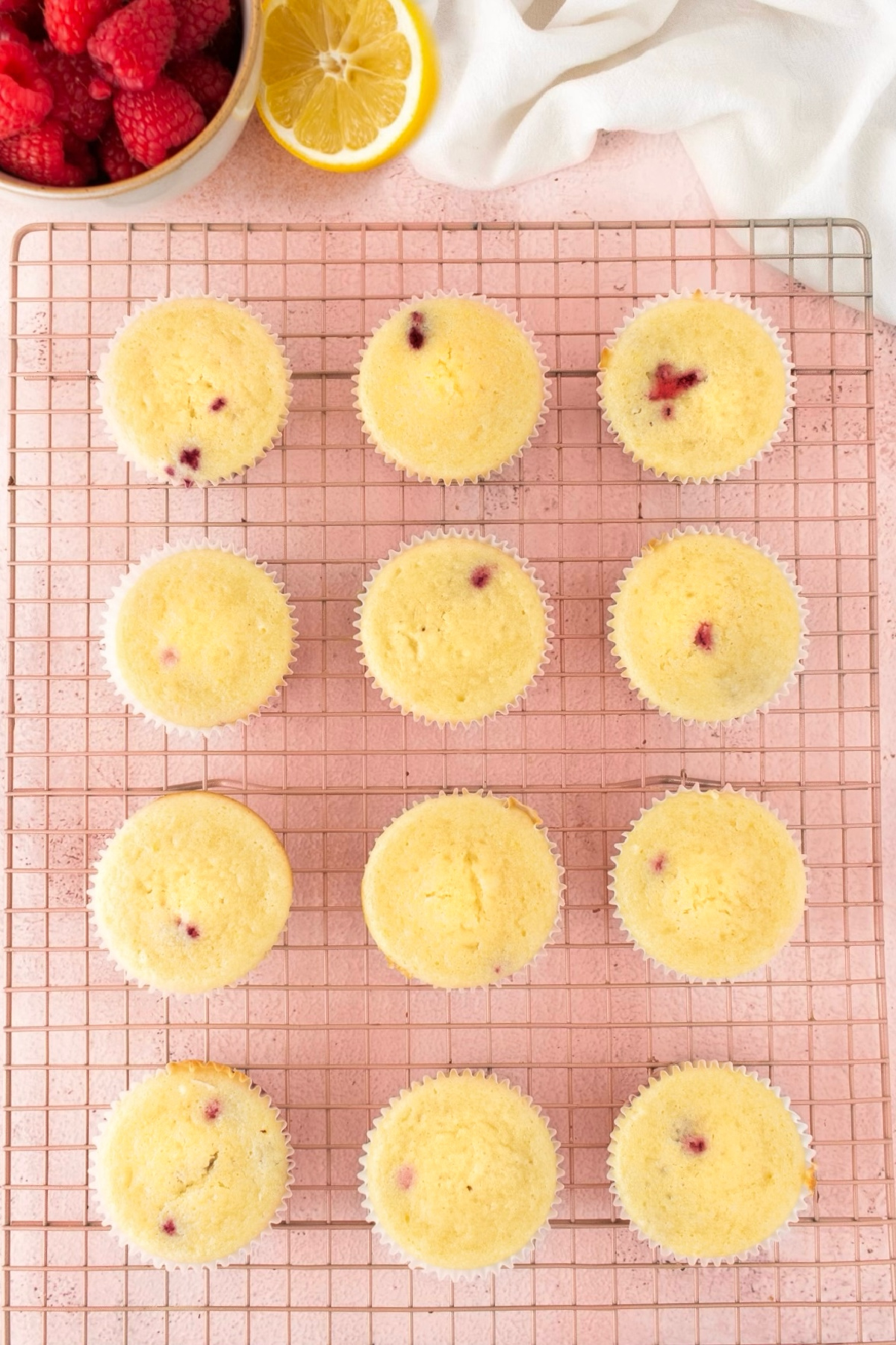 The cupcakes cooled on the rack to pipe the icing.