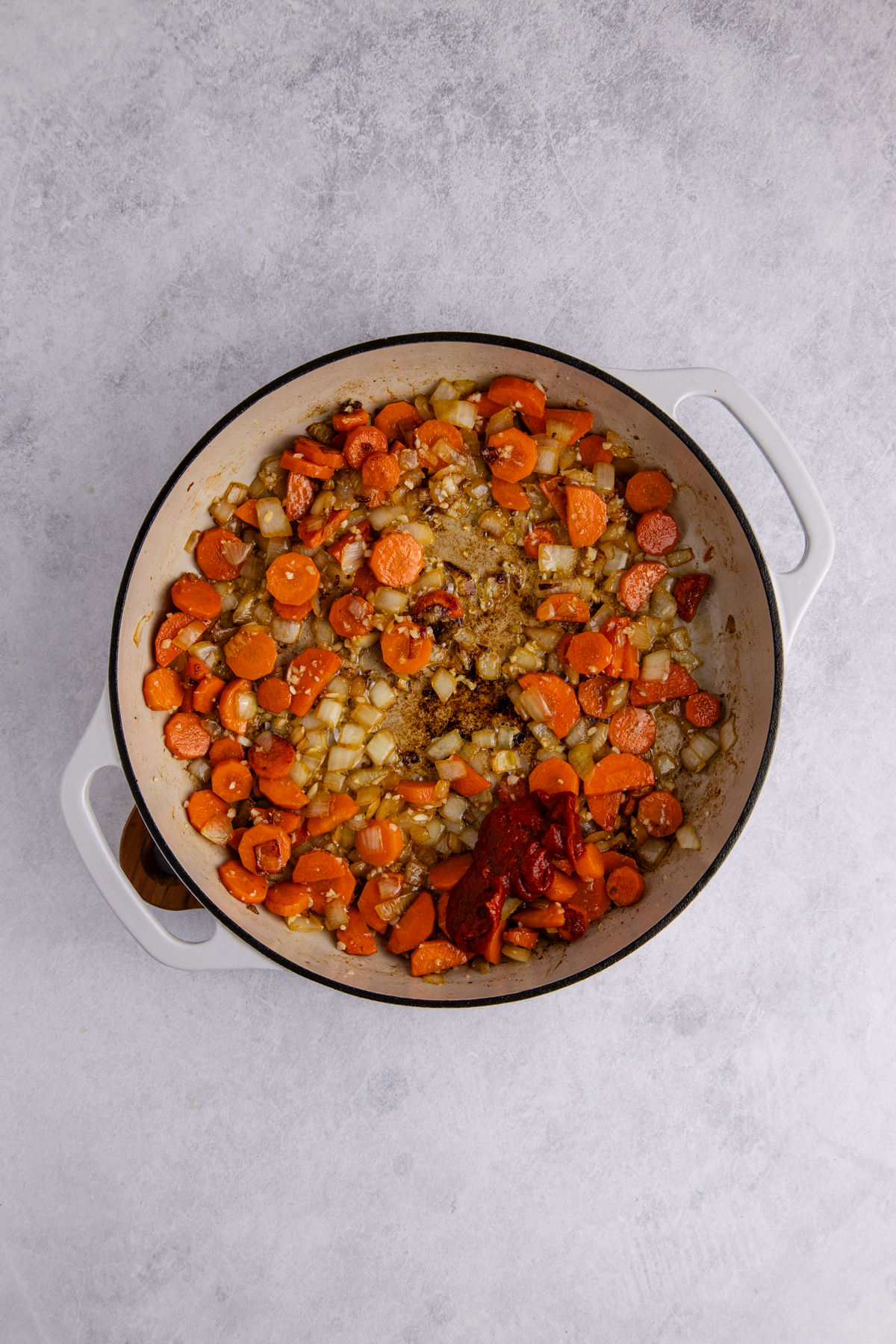 Carrots, onions, garlic and tomato paste in the skillet.