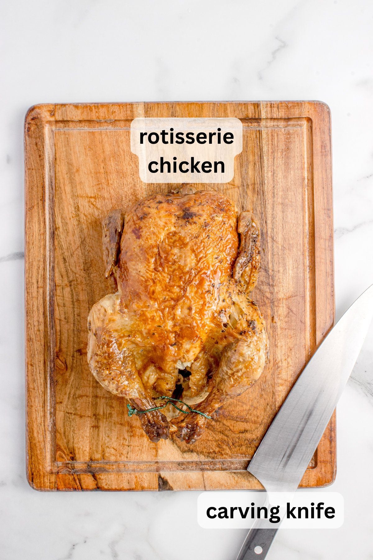 Everything needed to carve a rotisserie chicken on a counter.