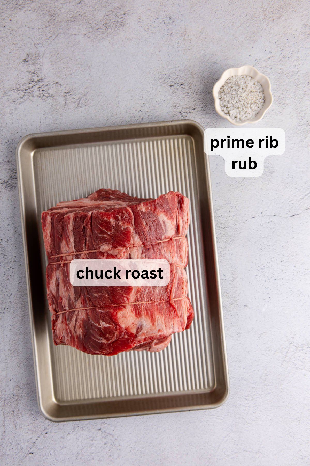 Ingredients to make this prime rib on a table.