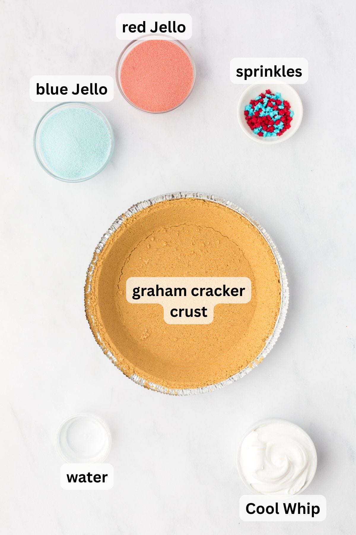 Ingredients to make this patriotic pie in bowls on a table.