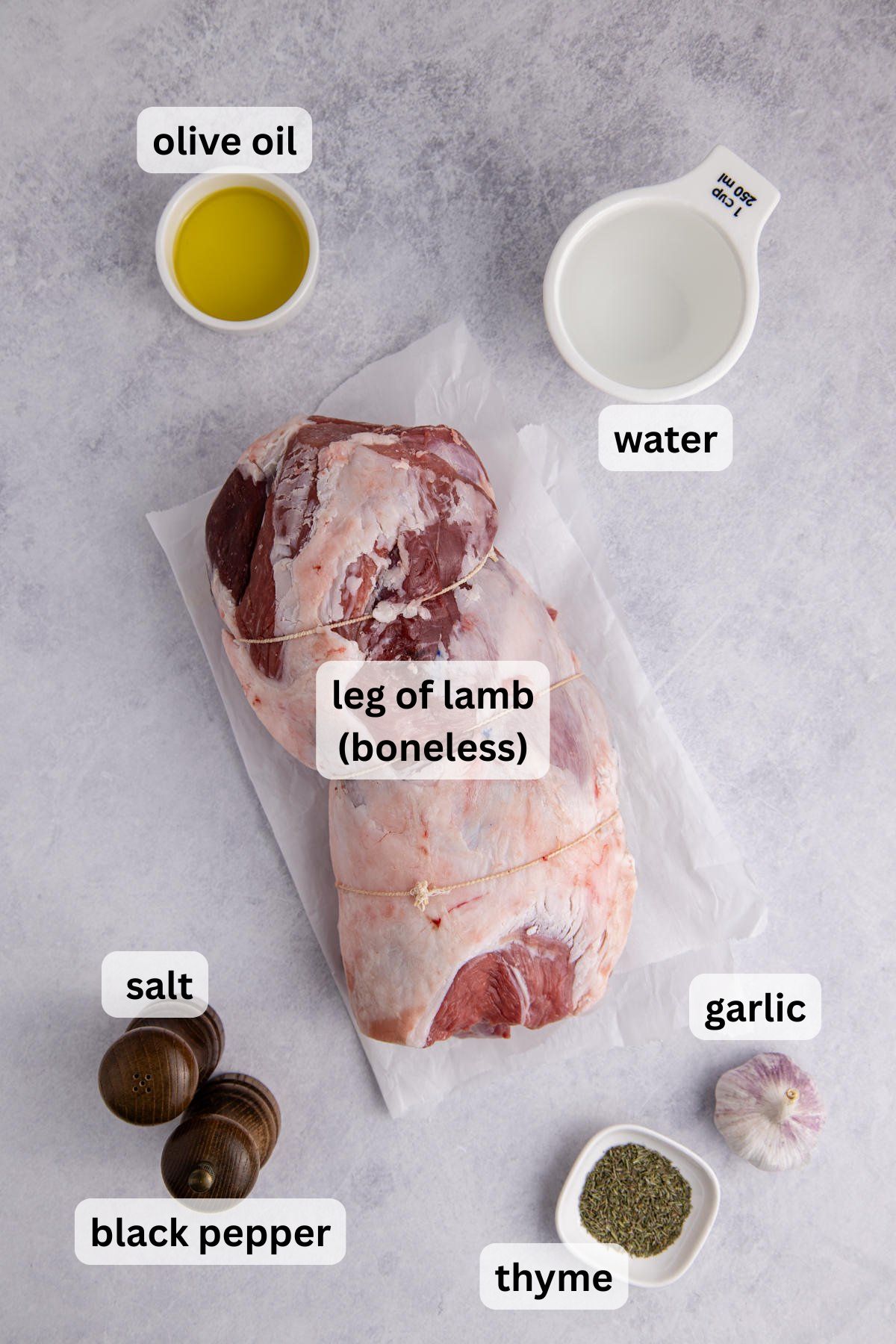 Ingredients to make this lamb on a table.