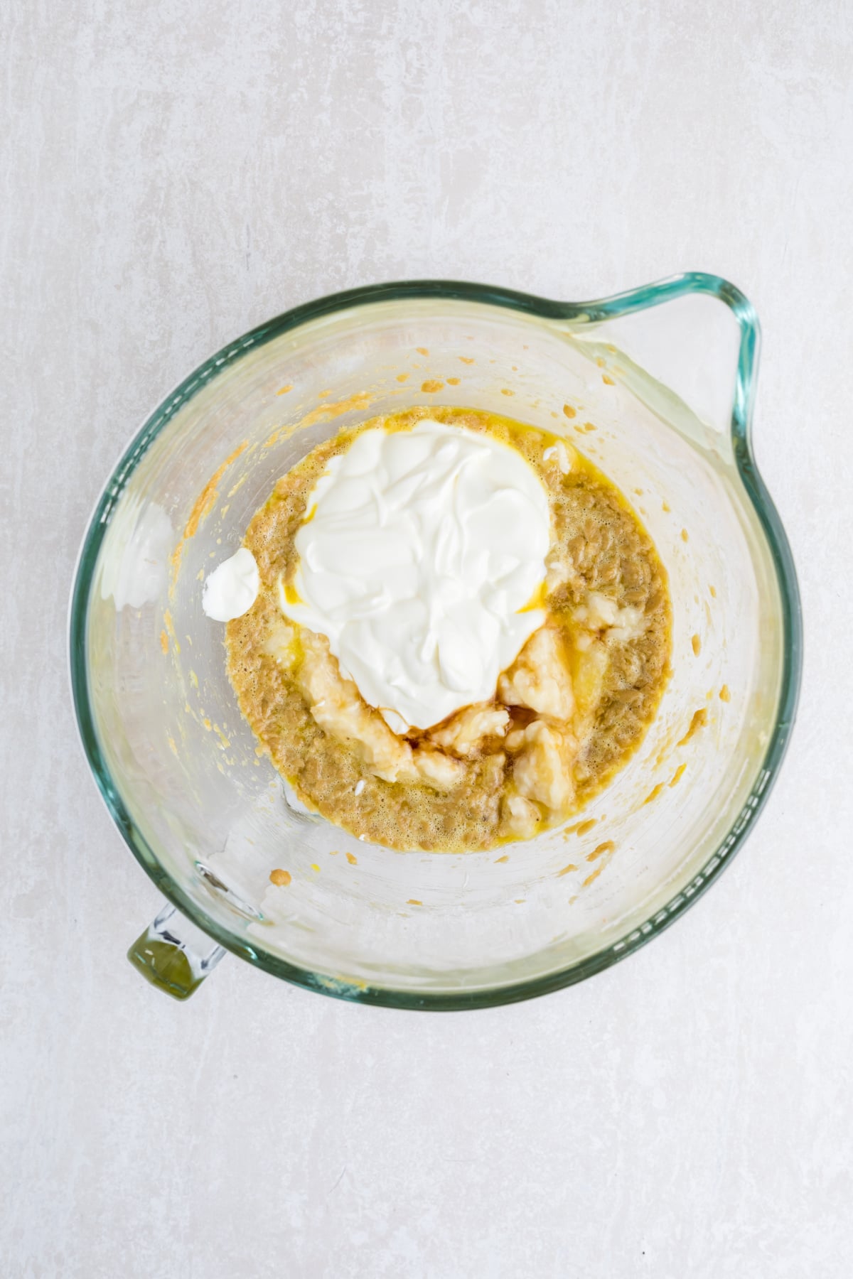 Sour cream added to cake batter.