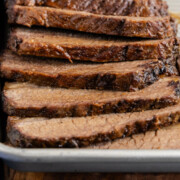 Oven brisket sliced on a plate.