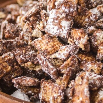 A bowl of chocolate caramel muddy buddies.