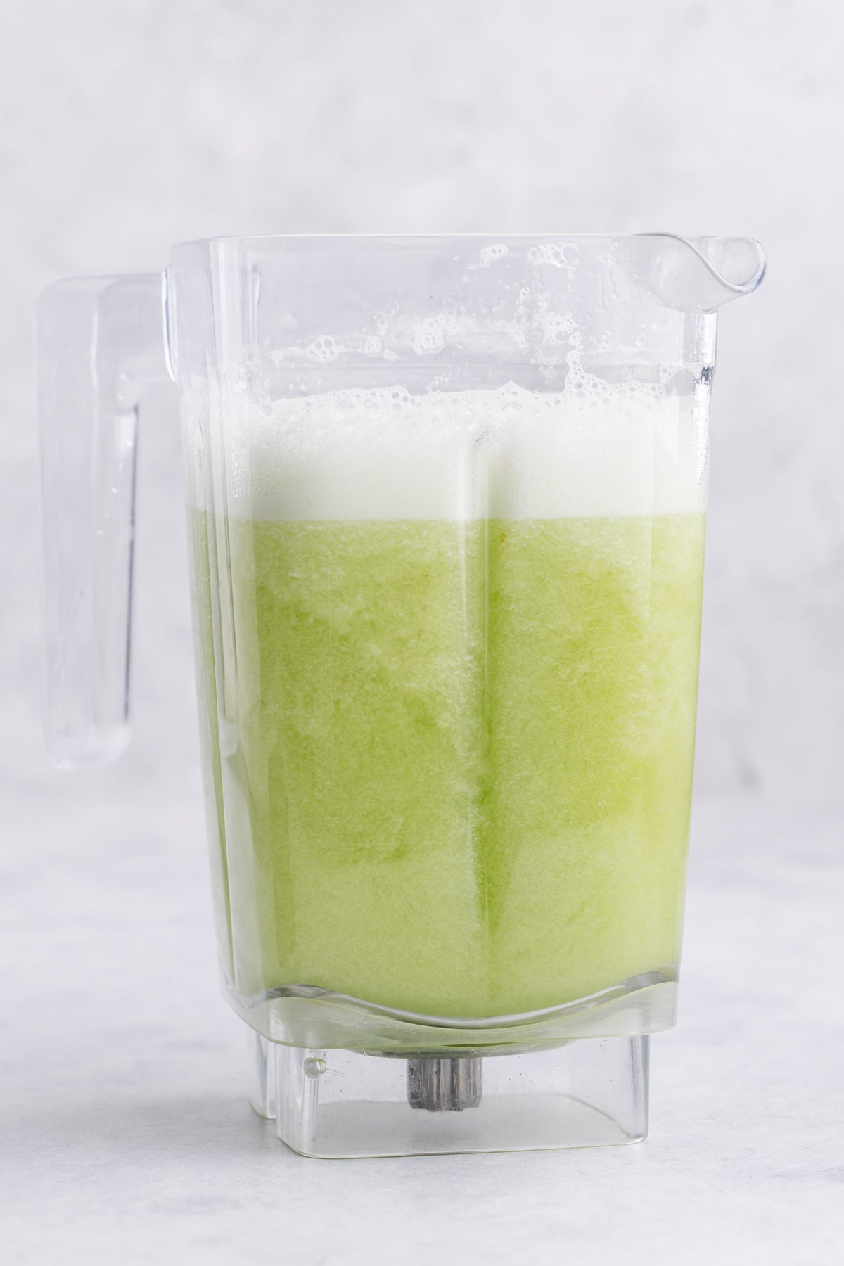 Cucumber and water blended in a blender.