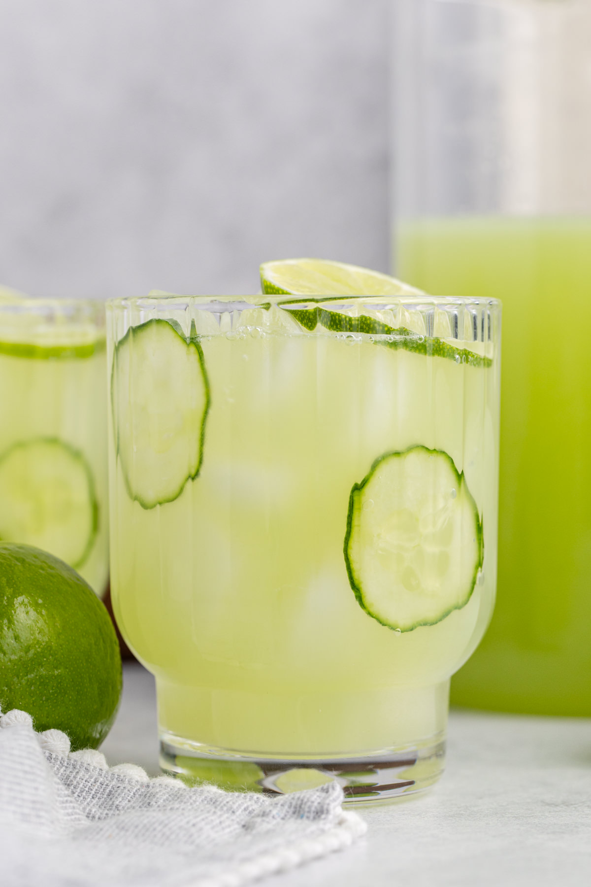 A glass with cucumber water.