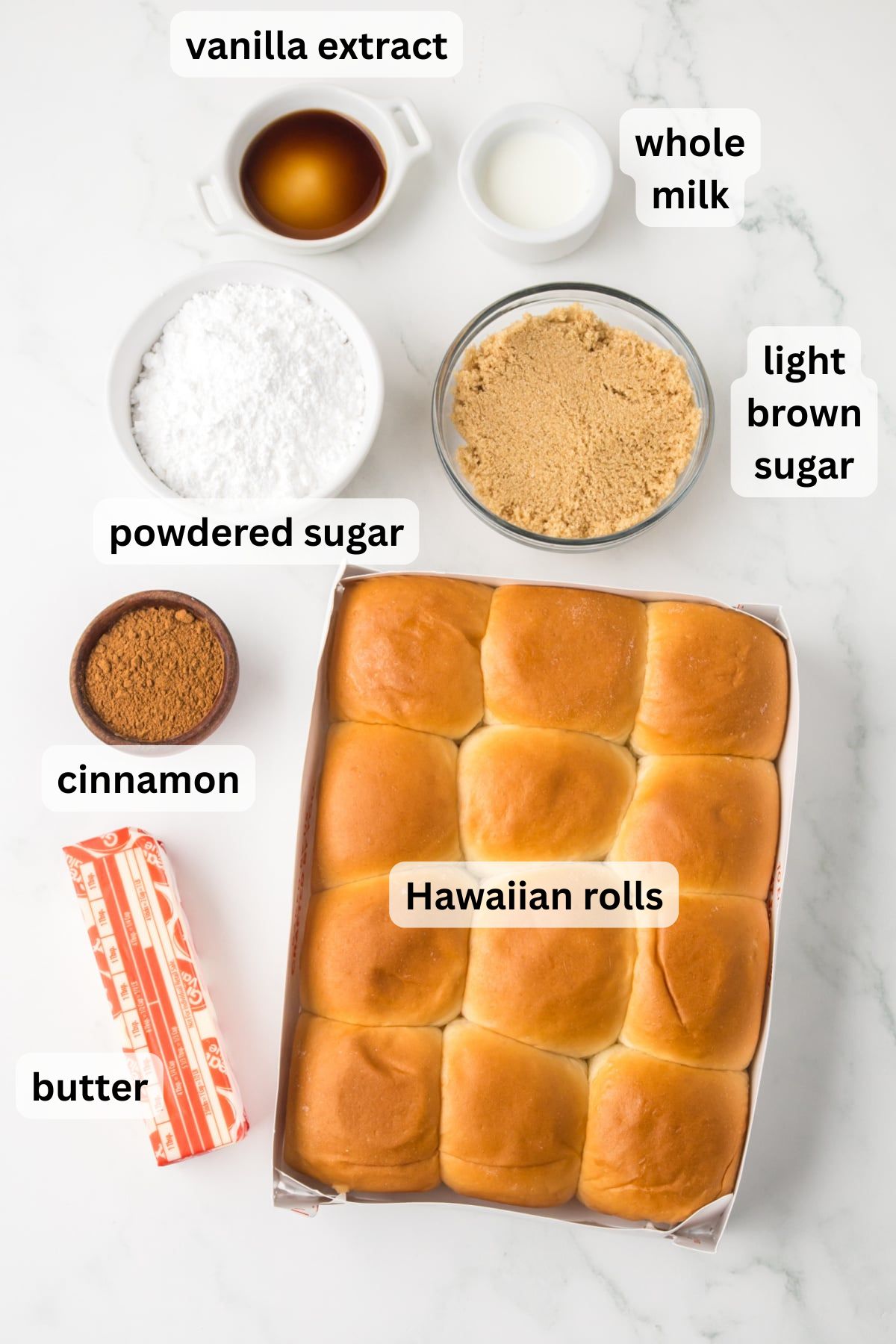 All the ingredients needed to make Hawaiian Roll Cinnamon Rolls in bowls on a table