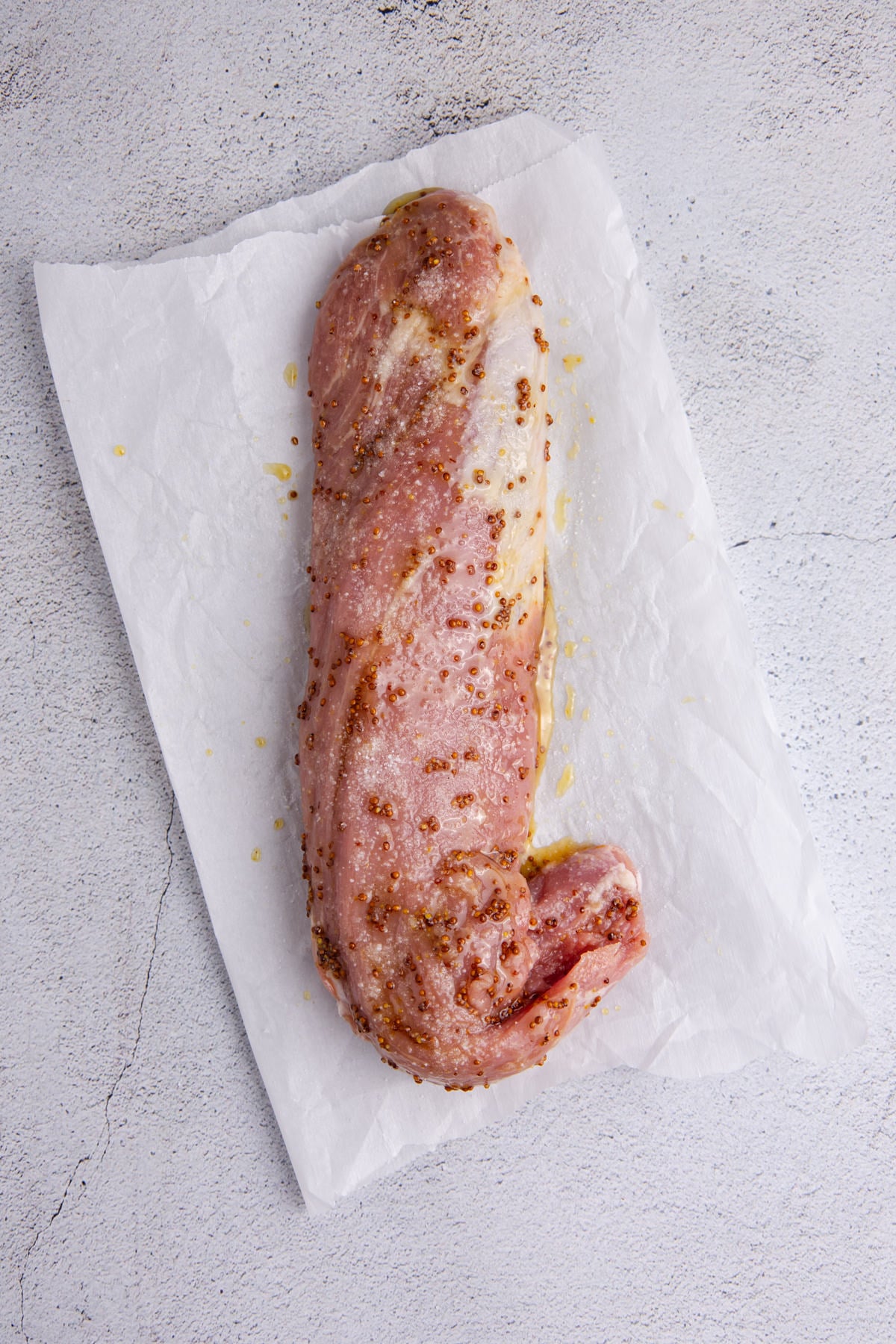 A pork tenderloin with the glaze all over it.