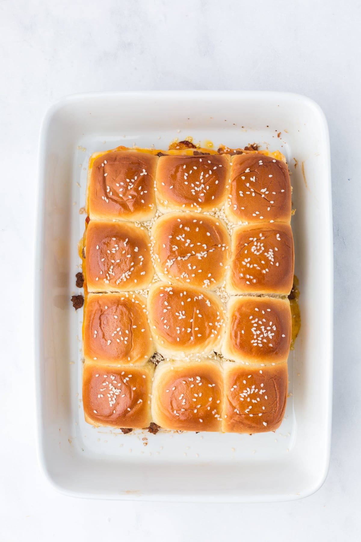 Seed covered sliders out of the oven.