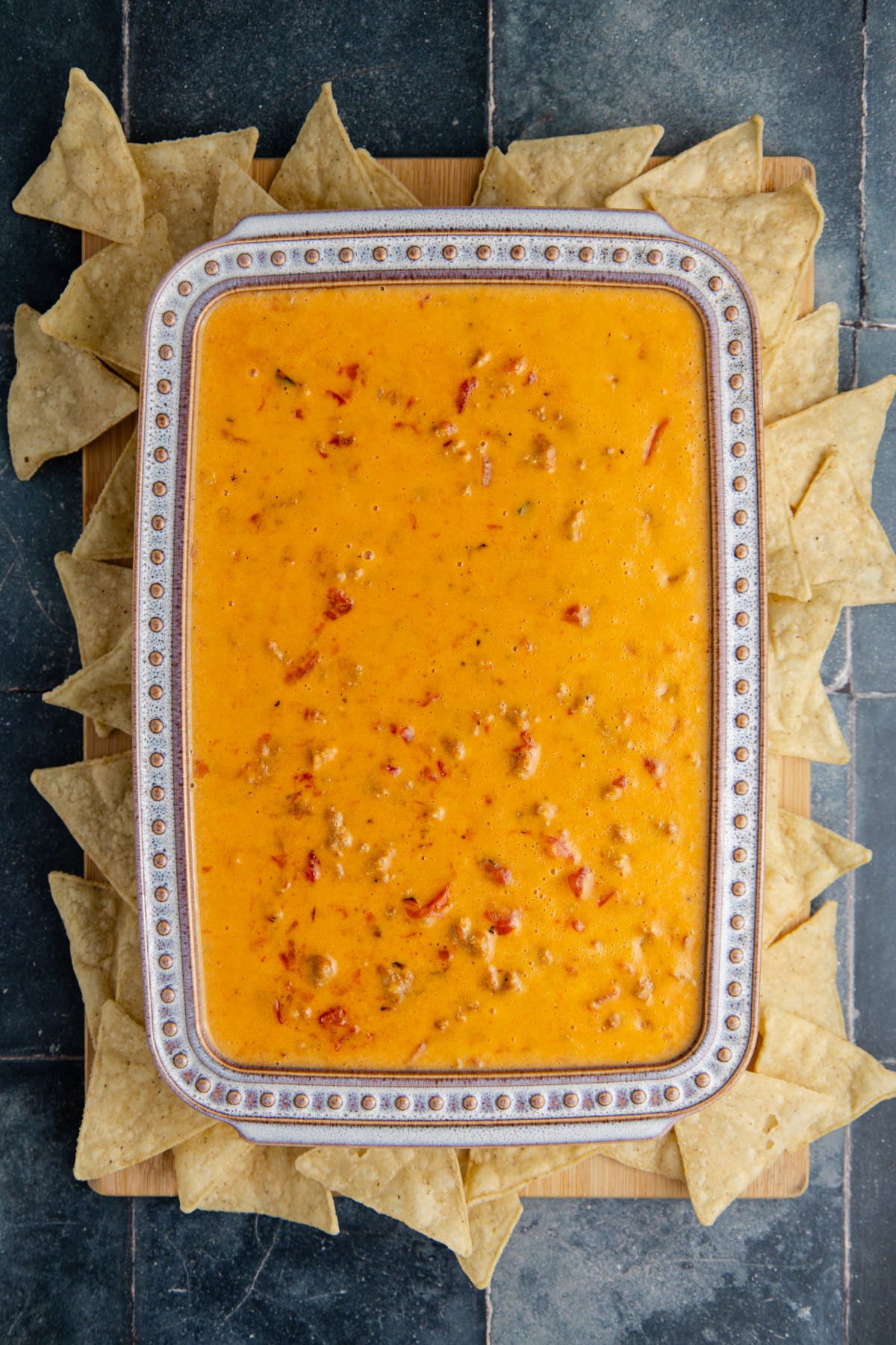 The sausage queso in a serving dish.