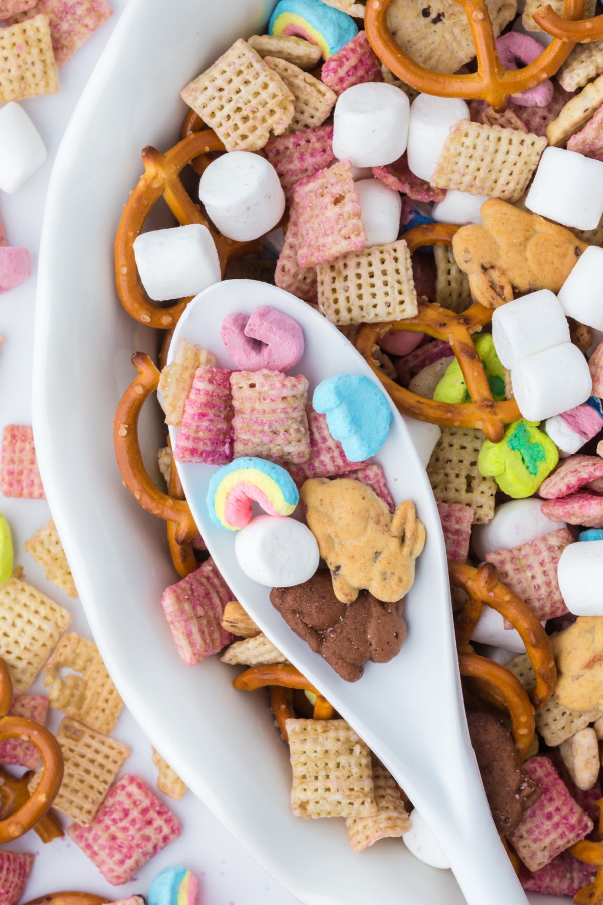 A spoonful resting on top of a bowlful.