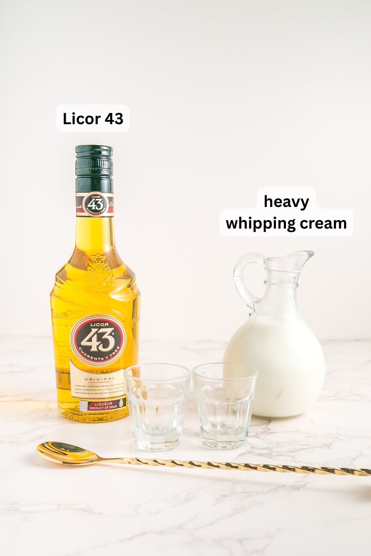 Ingredients to make Baby Beer Shot in bottles on a table