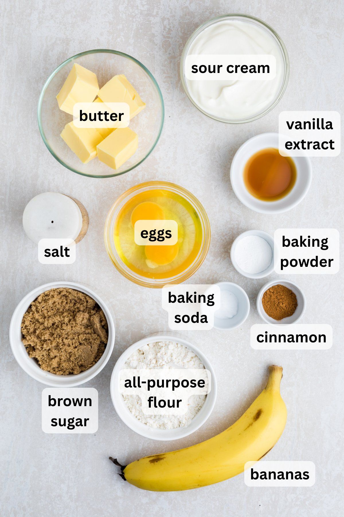 Ingredients for Banana Upside Down Cake in bowls on a table