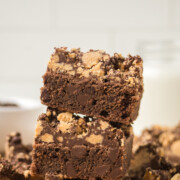 A stack of buckeye brownies on a table.