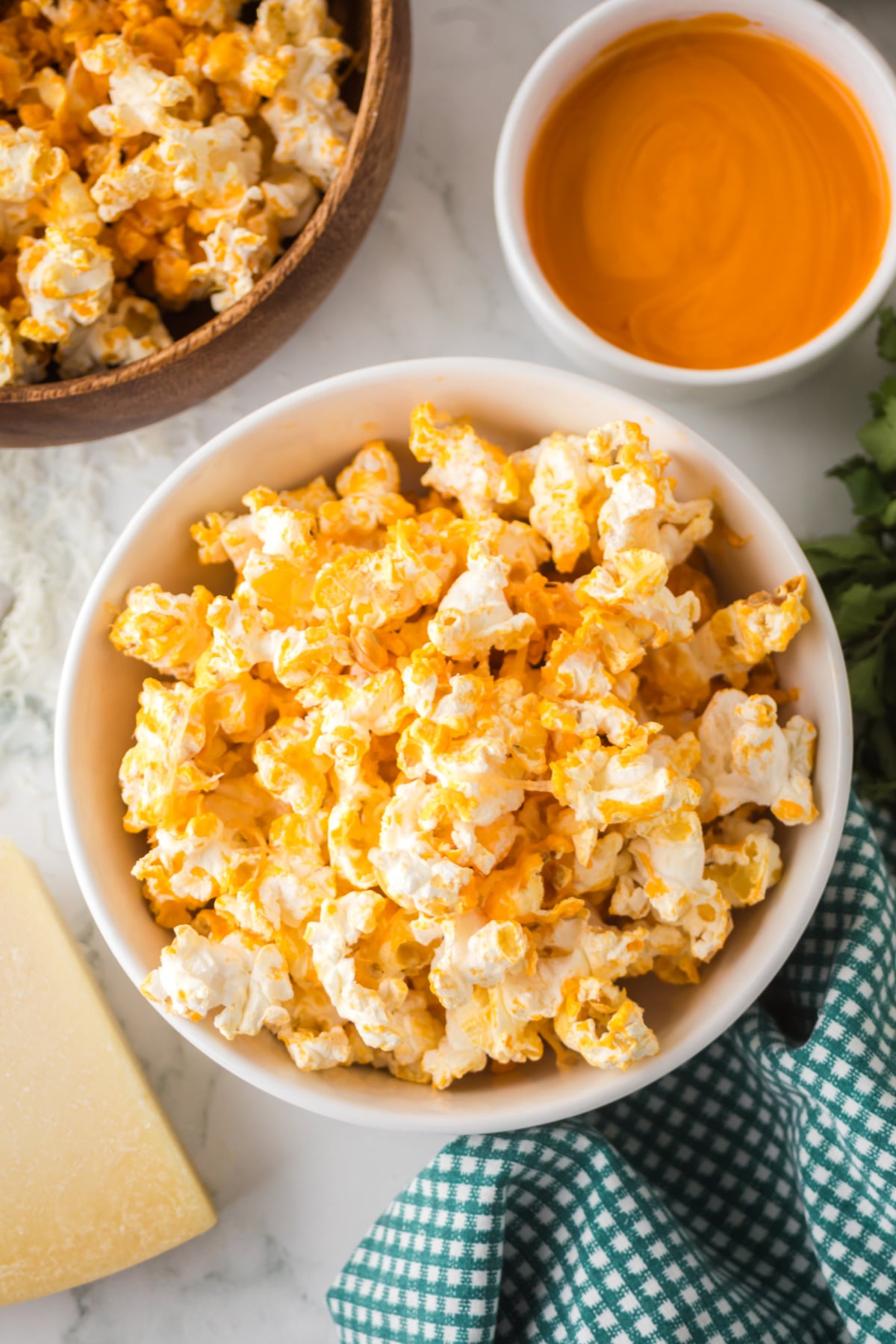 A bowl of popcorn on a table.