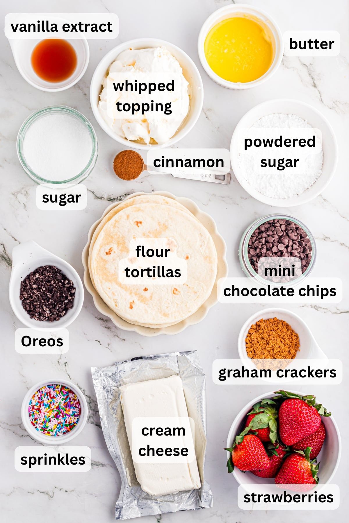 Ingredients to make dessert tacos in bowls on a table.