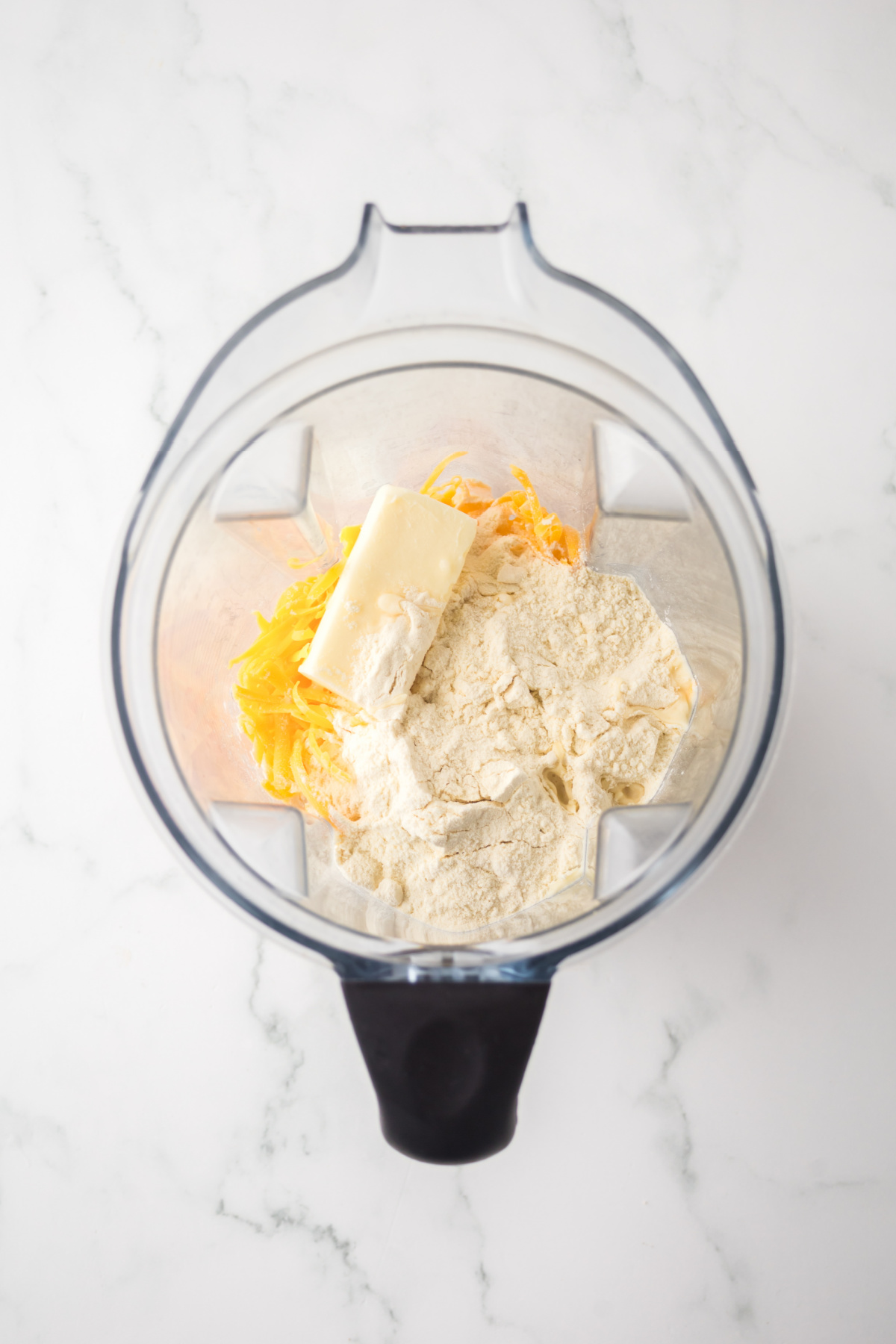 A blender with all of the dough in it.