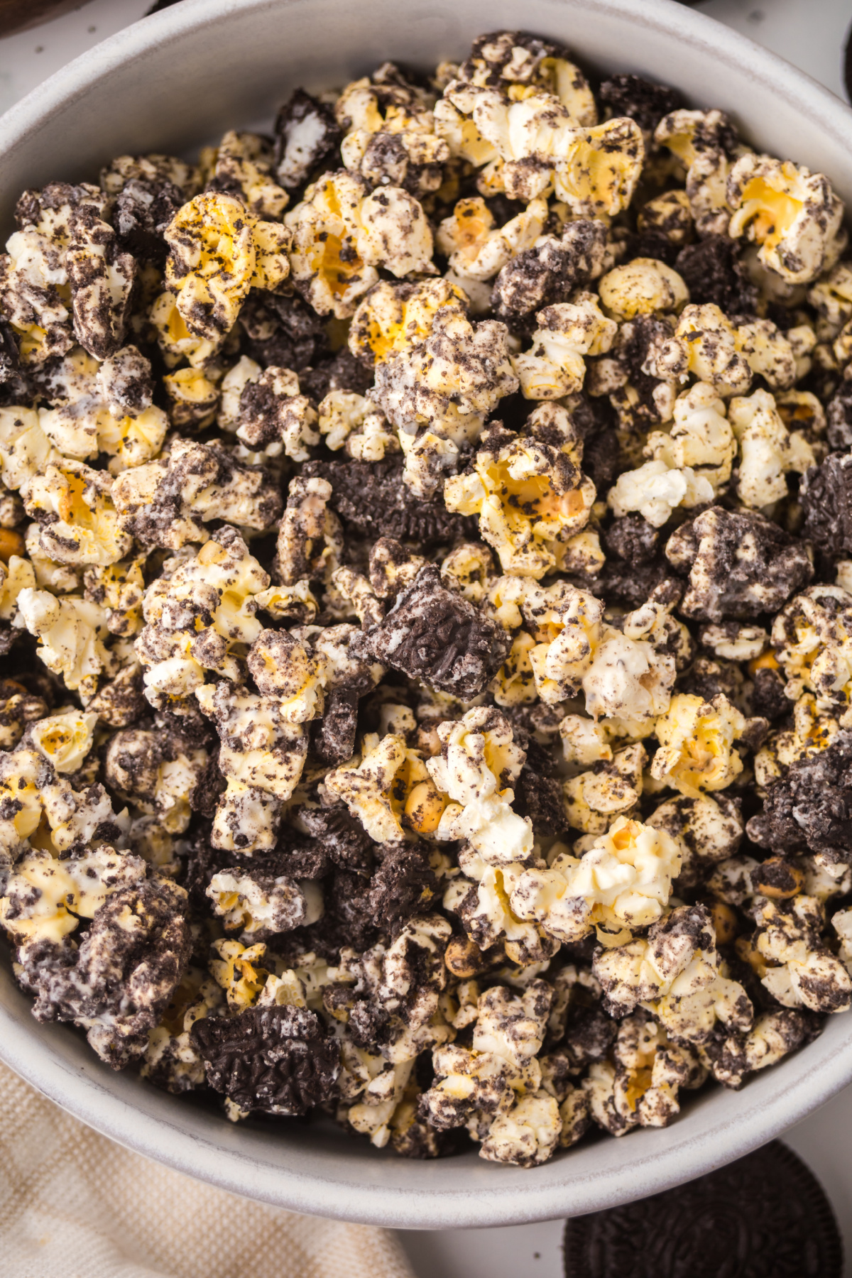A bowl of popcorn on a table.