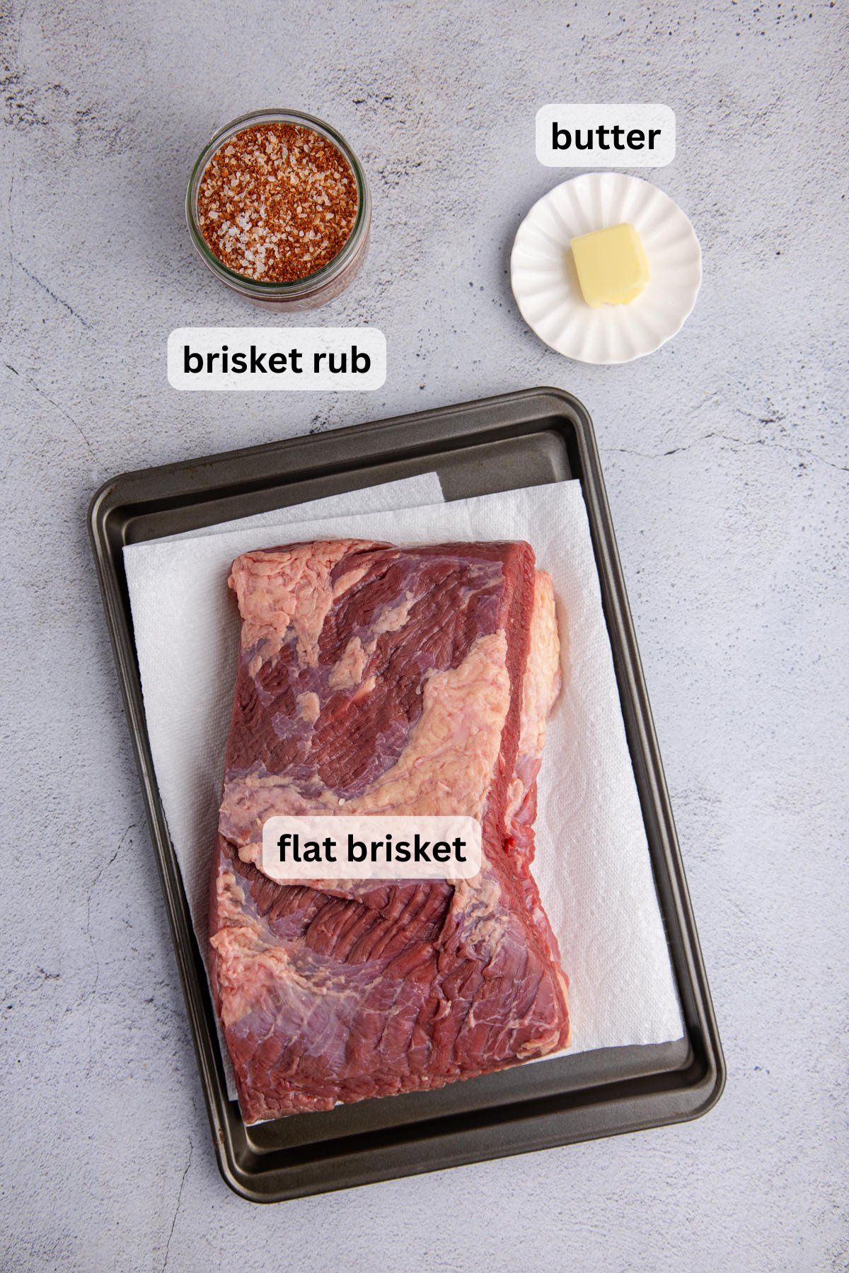 Ingredients for oven roasted brisket on a table.