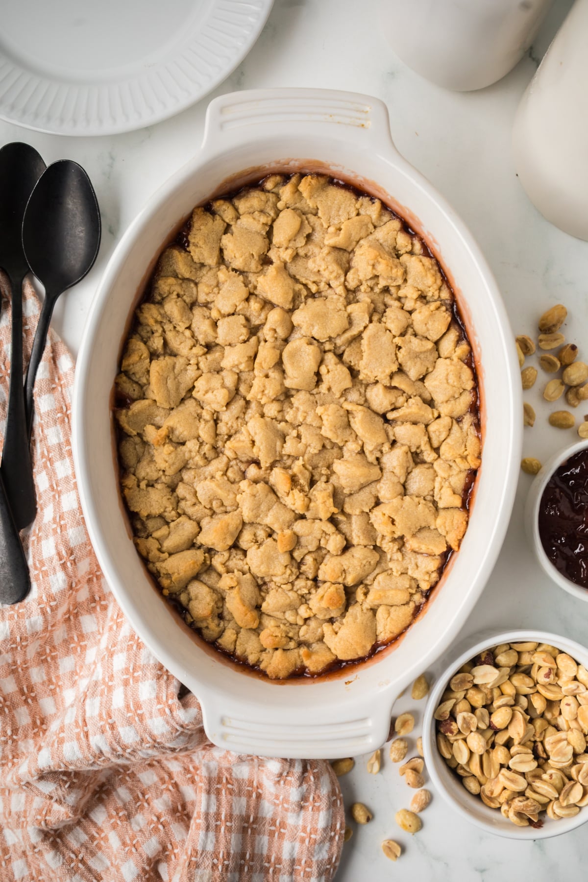 warm cobbler with soft cookie topping in baking dish