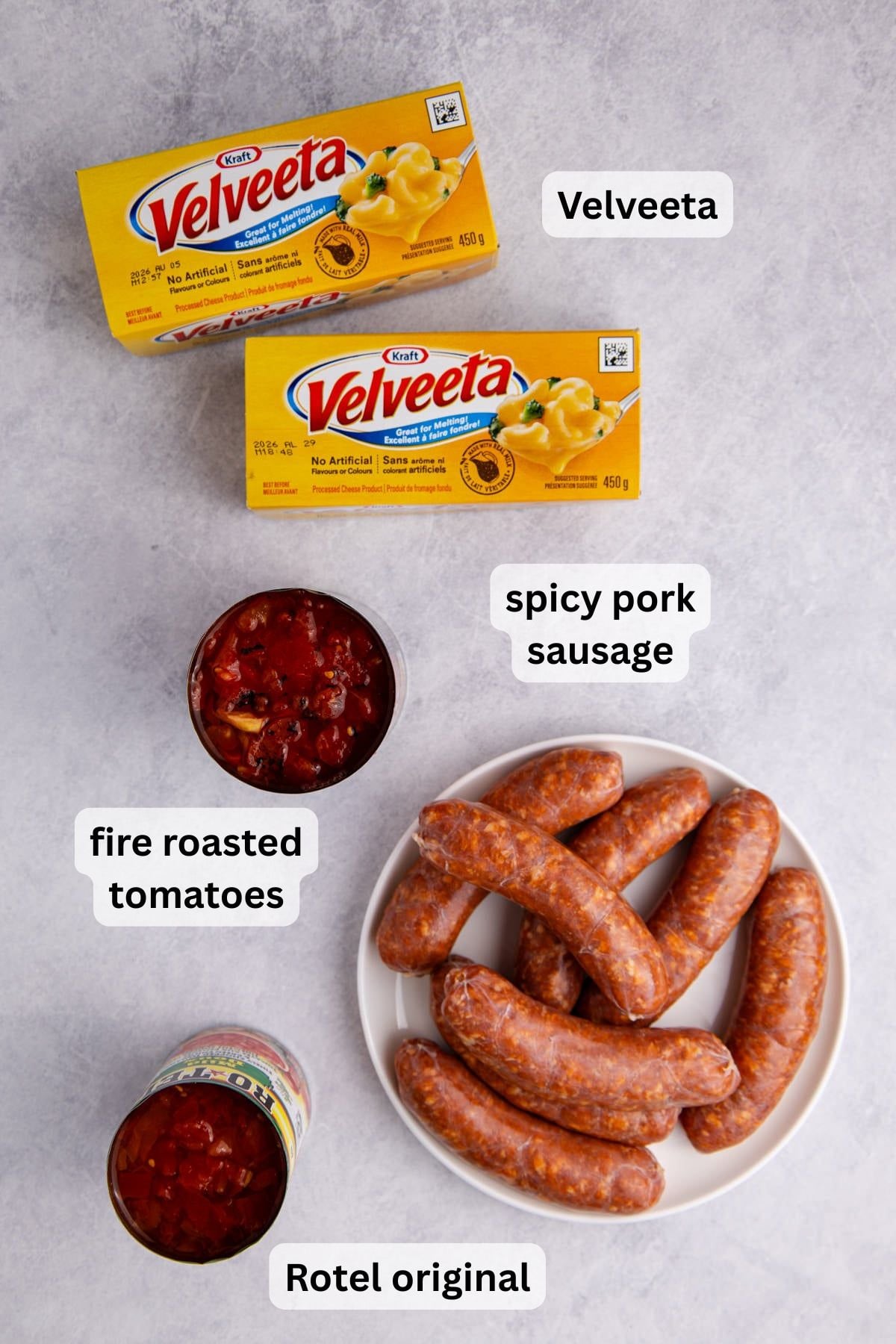 Ingredients for sausage queso dip on a table.