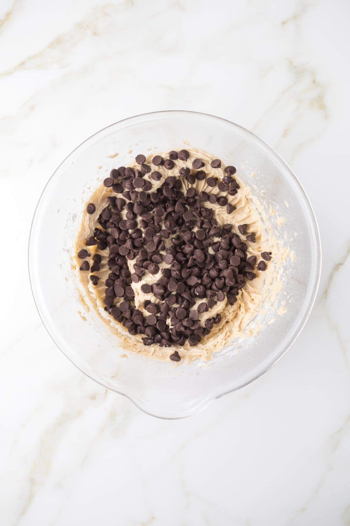 Chocoloate chips added to bowl