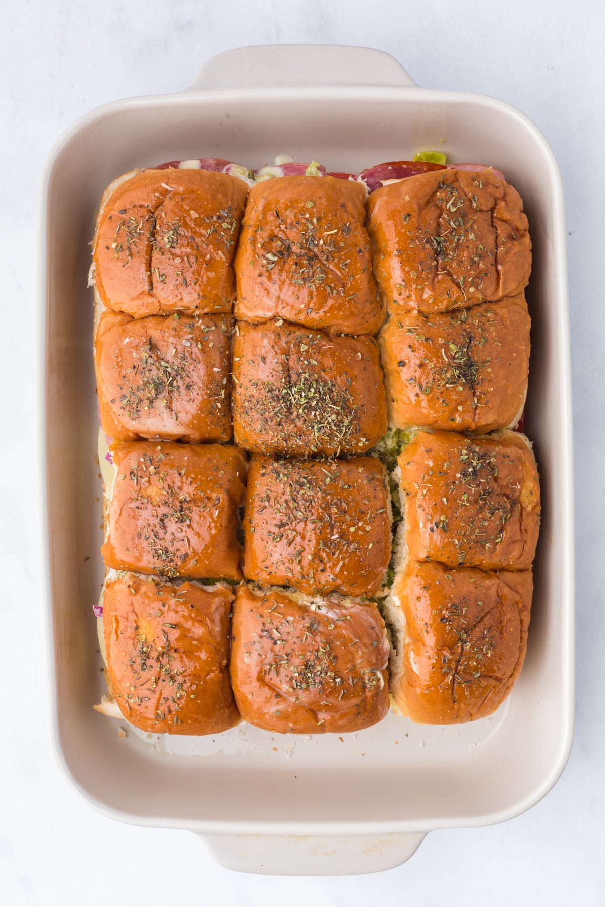baked sliders in casserole dish