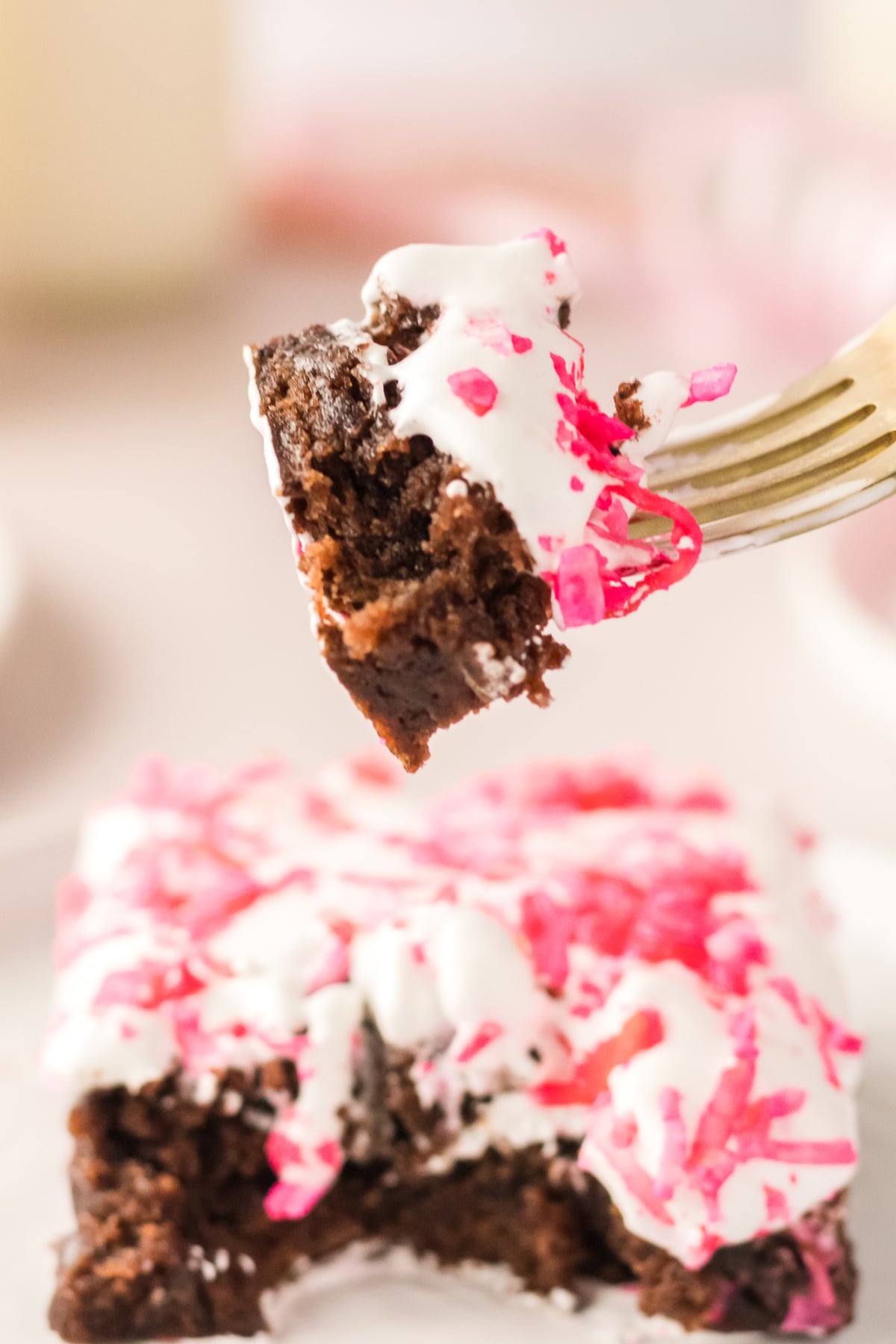 A fork bite held in the air.