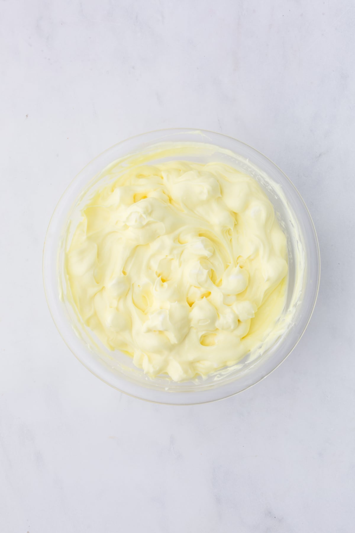 Folded lemon fluff mixture until smooth and creamy for a no bake lemon fluff dessert