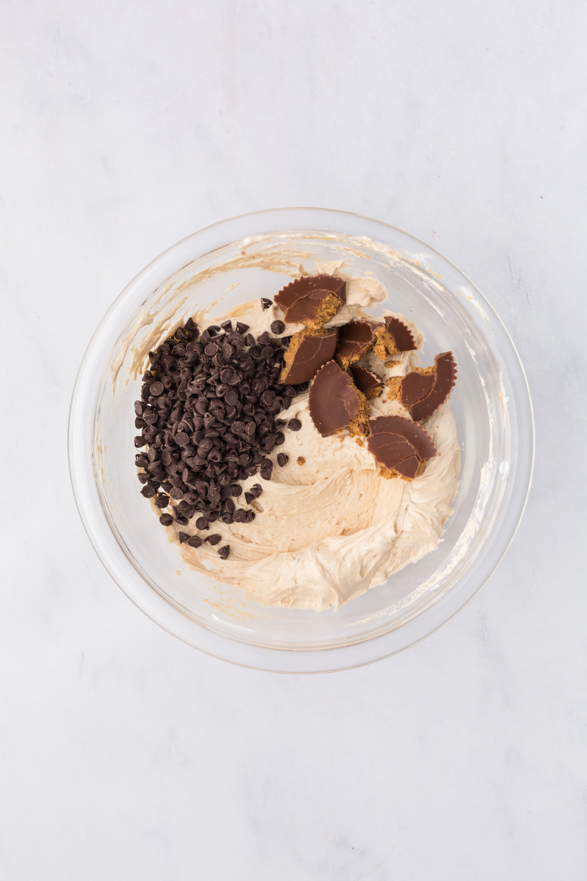 Chopped Reese's peanut butter cups and chocolate chips added to fluff.