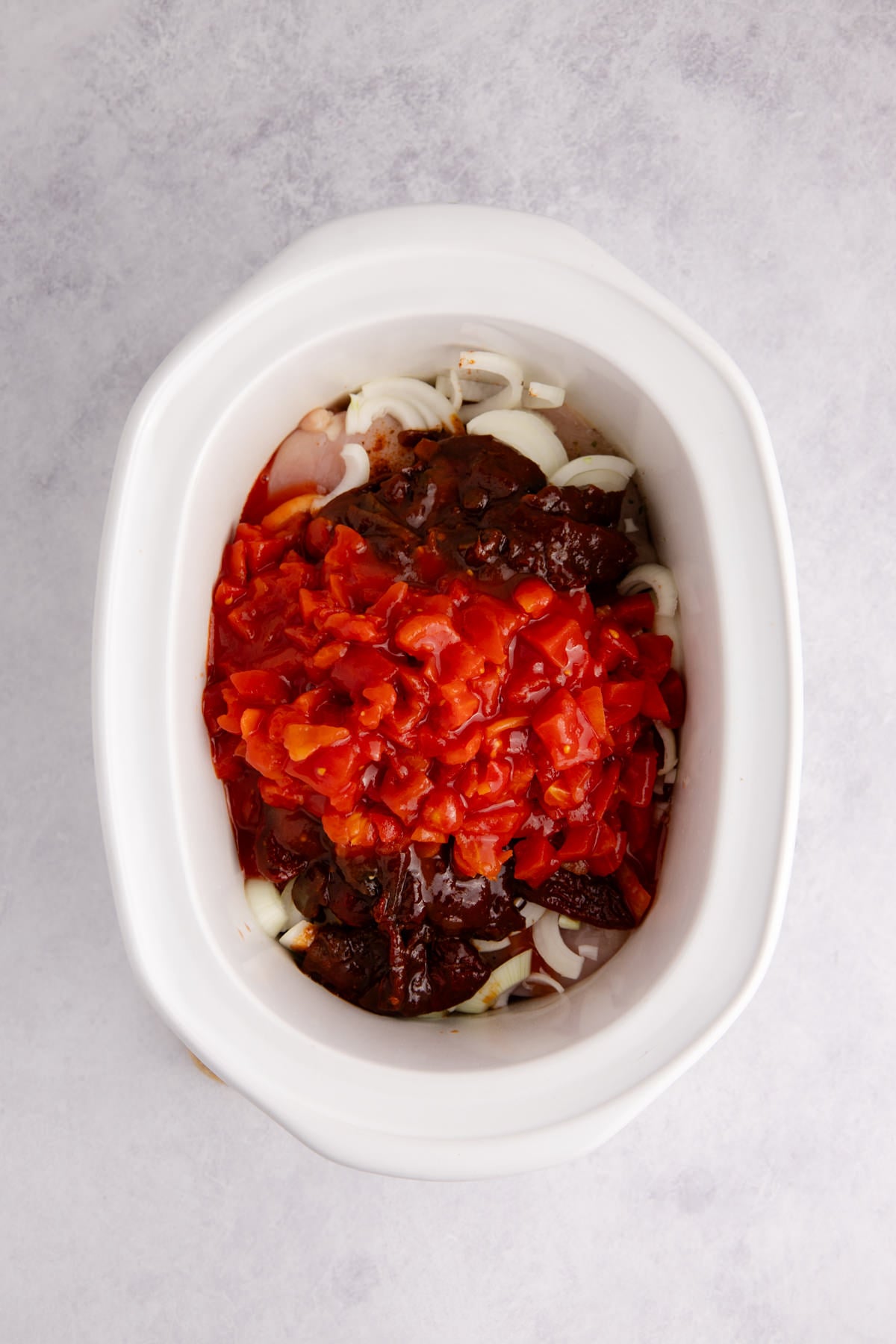 All the ingredients into the slow cooker.