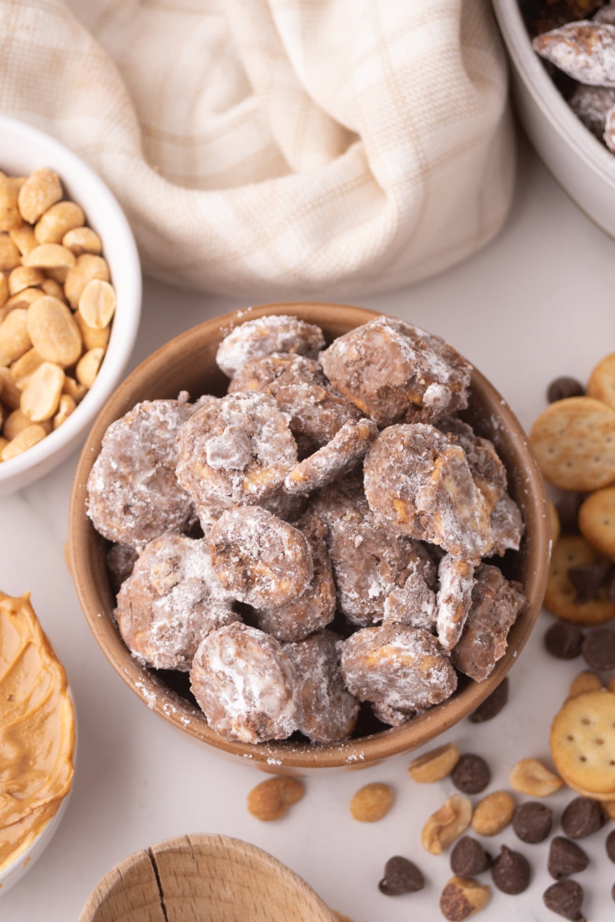 A bowl of ritz muddy buddies snack mix ready to serve