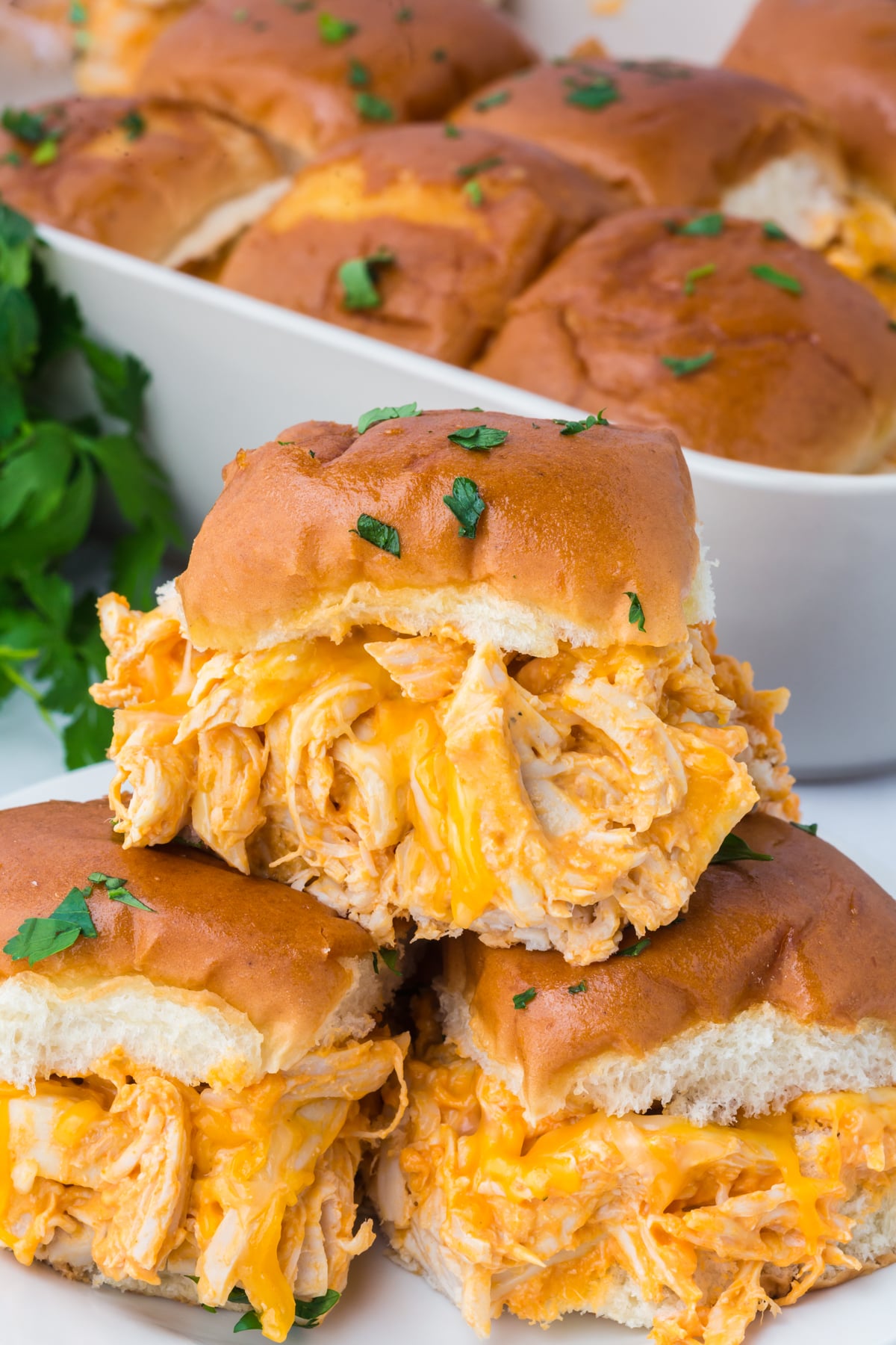 Two sliders on plate with one on top