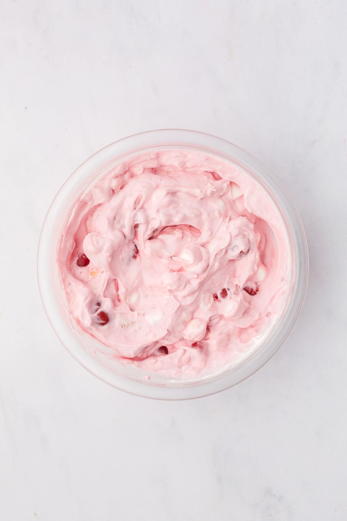 Cherry pie filling add to the mixture in a bowl.
