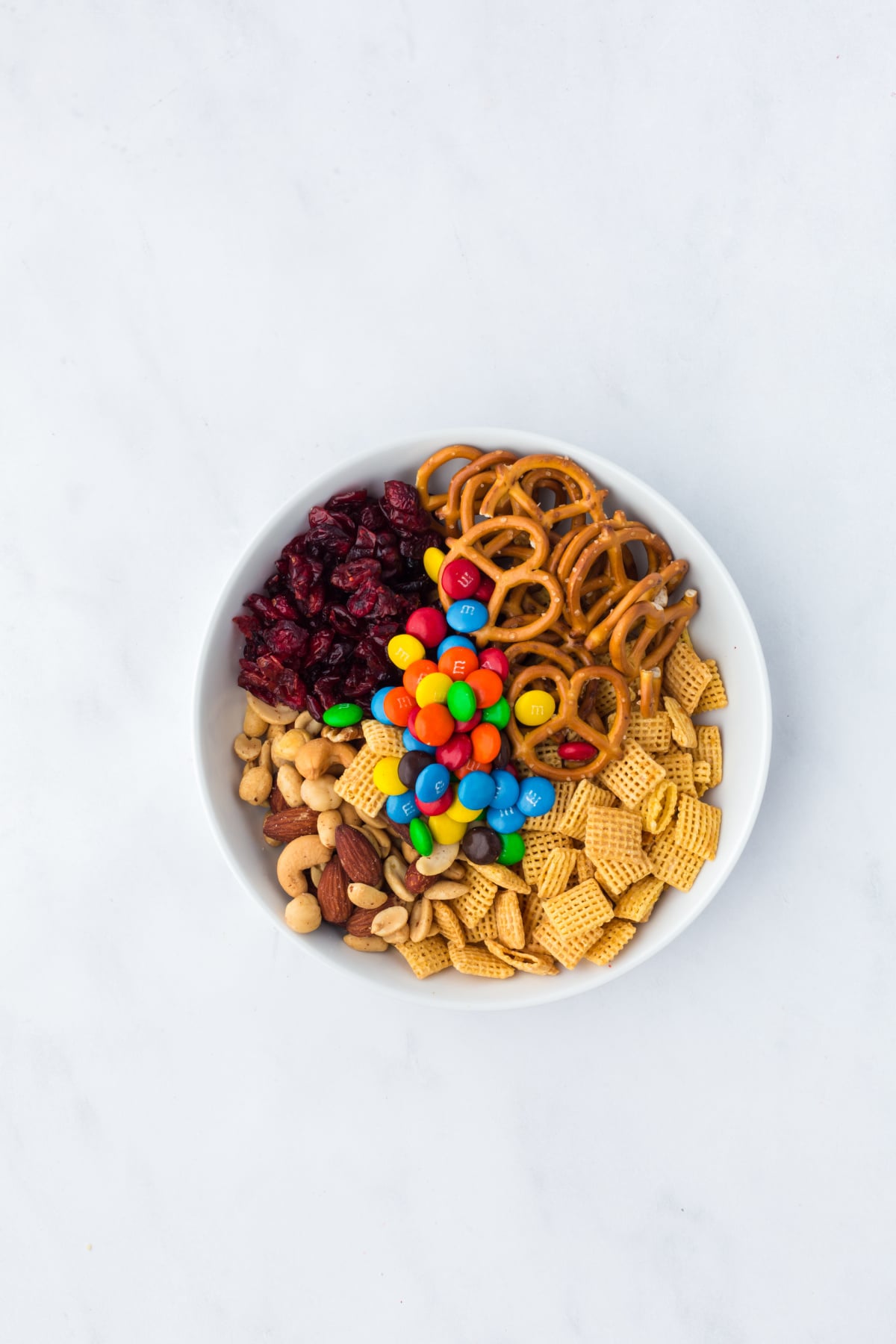 trail mix ingredients in bowl on table
