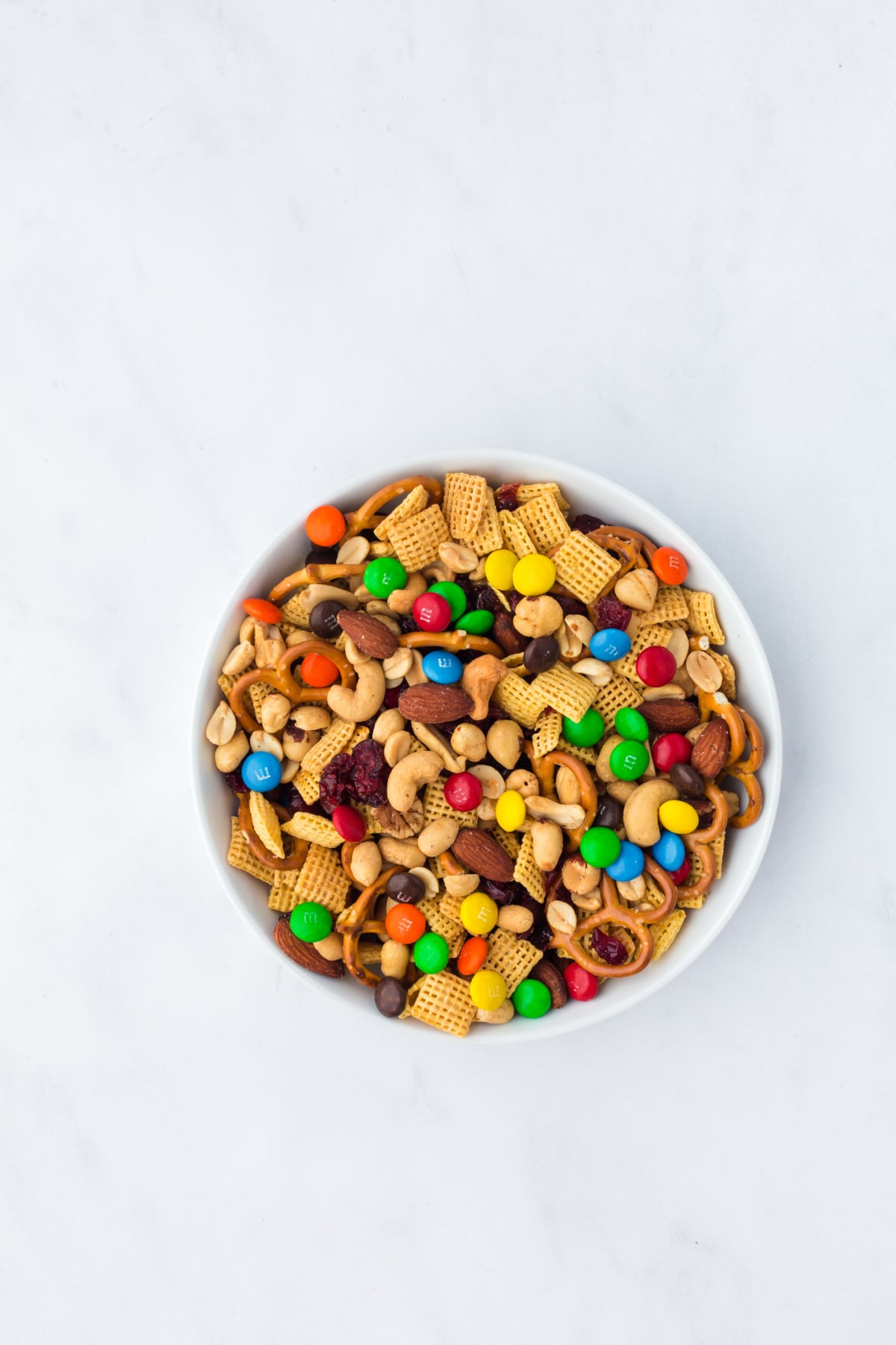 Blended trail mix ingredients in bowl